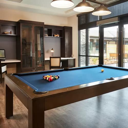 pool table lounge at chartwell wescott retirement residence