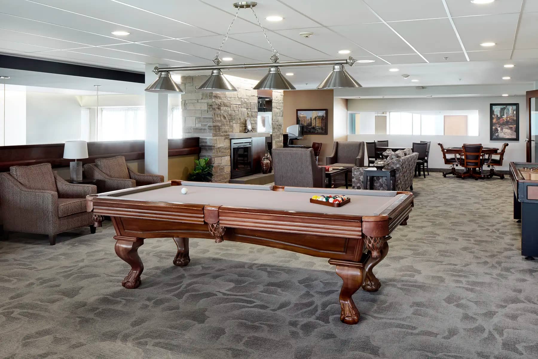 Games room with pool table at Chartwell Greenway