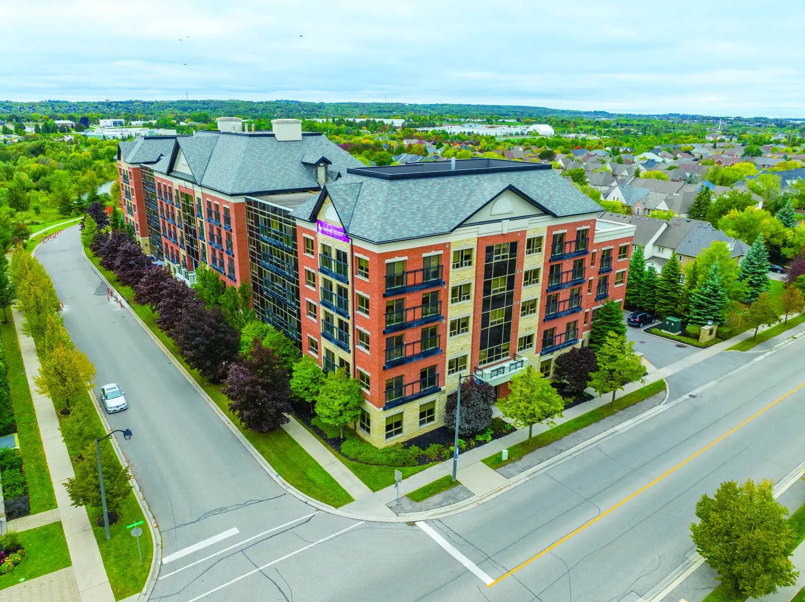 Street view of residence at Chartwell Hollandview Trail Retirement Residence.