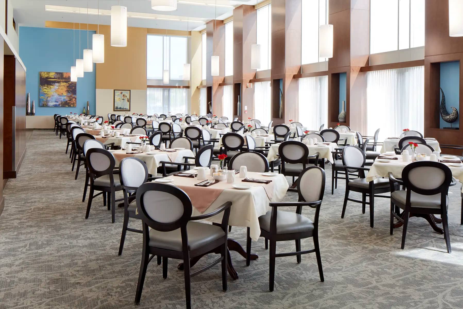 Dining room with kitchen and chairs at Chartwell Greenway