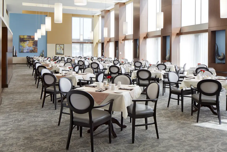 Dining room with kitchen and chairs at Chartwell Greenway
