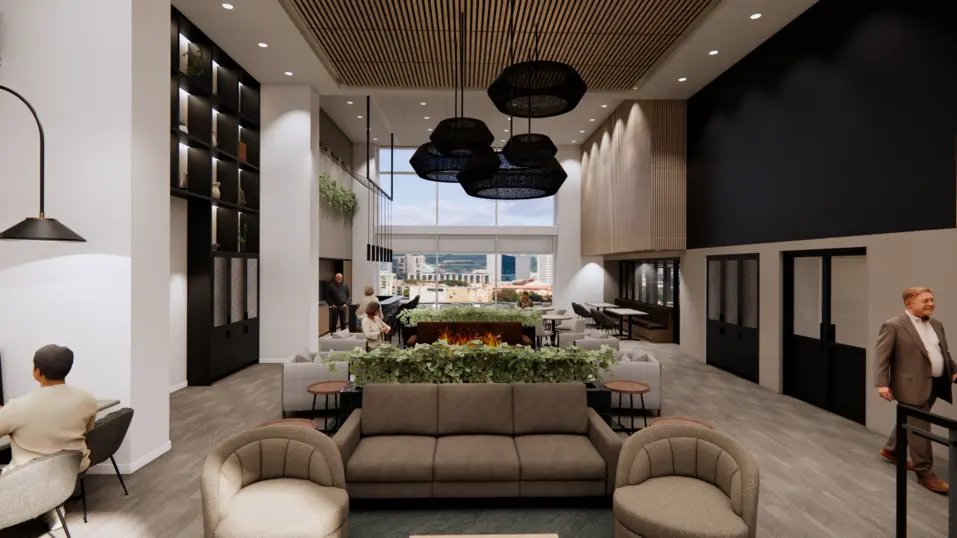 Chartwell Le Prescott's living room in the expansion phase. Multiple seating areas with sofas and chairs