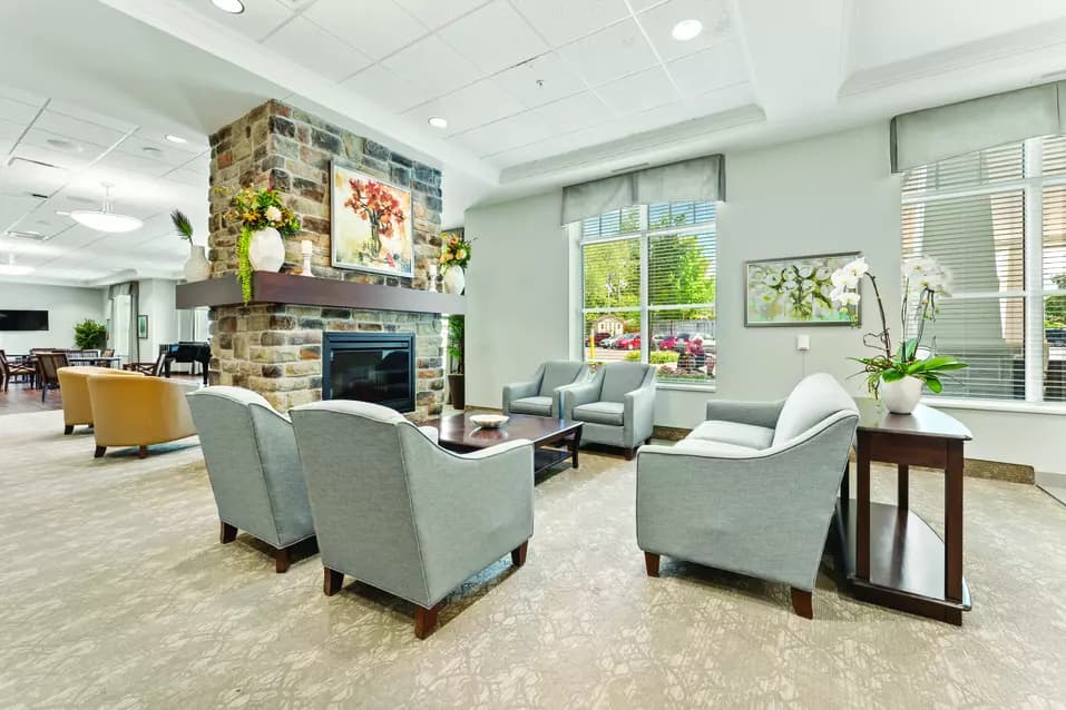 Chartwell Allandale Station Retirement Residence fireplace lounge.