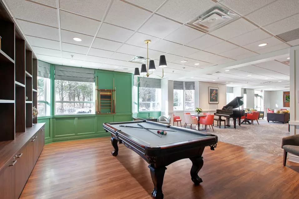 Chartwell Lakeshore Retirement Residence billiards room with entertainment space