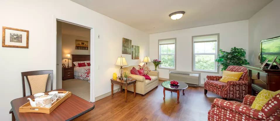 1 bedroom suite living room at chartwell jackson creek retirement residence