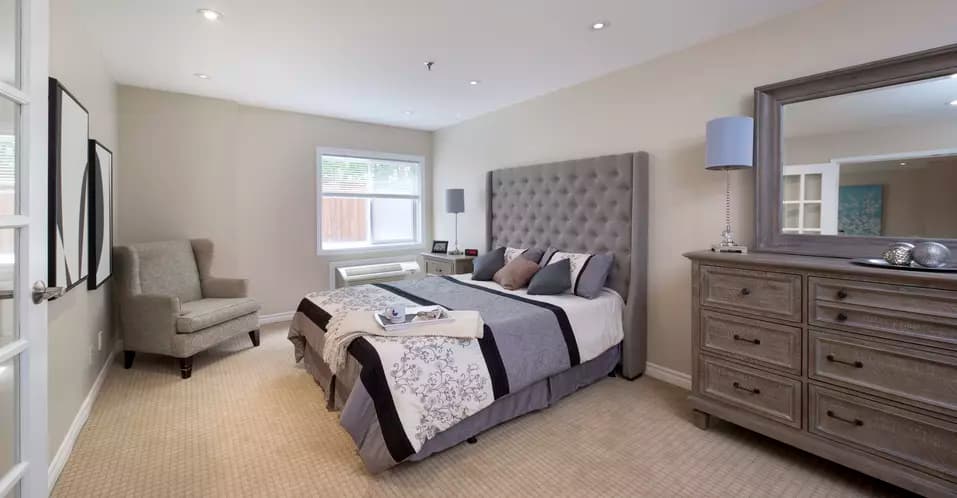 A spectacular bedroom of Chartwell Lansing Retirement Residence