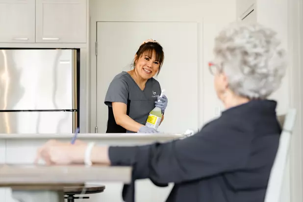 Chartwell Housekeeping Lady cleaning kitchen
