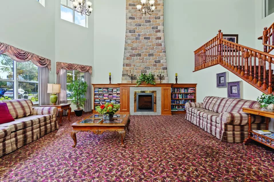 cozy lounge at chartwell collegiate heights retirement residence
