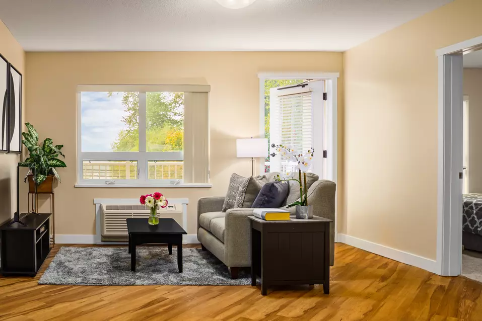 spacious living room at chartwell cedarbrooke retirement residence