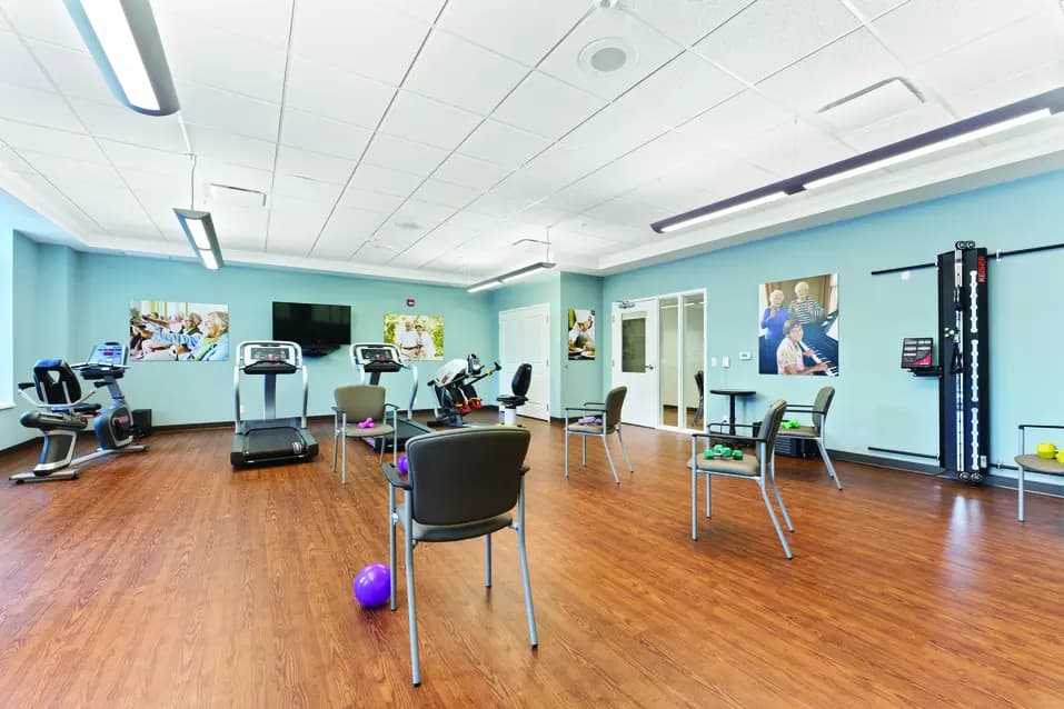 Chartwell Allandale Station Retirement Residence exercise room with equipment.