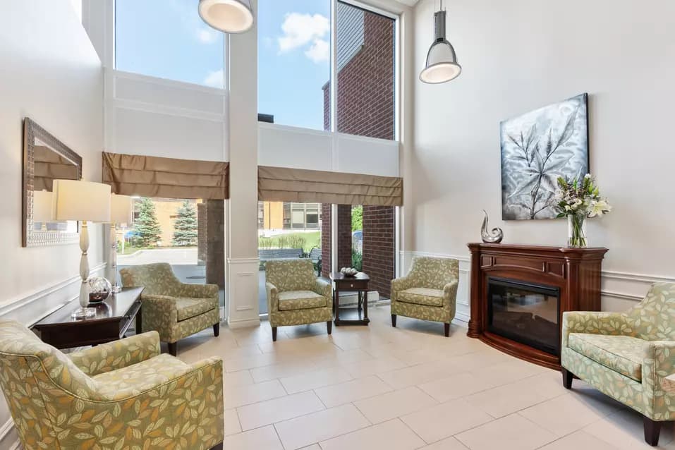 A beautiful illuminated common area of Chartwell Tranquility Place Retirement Residence