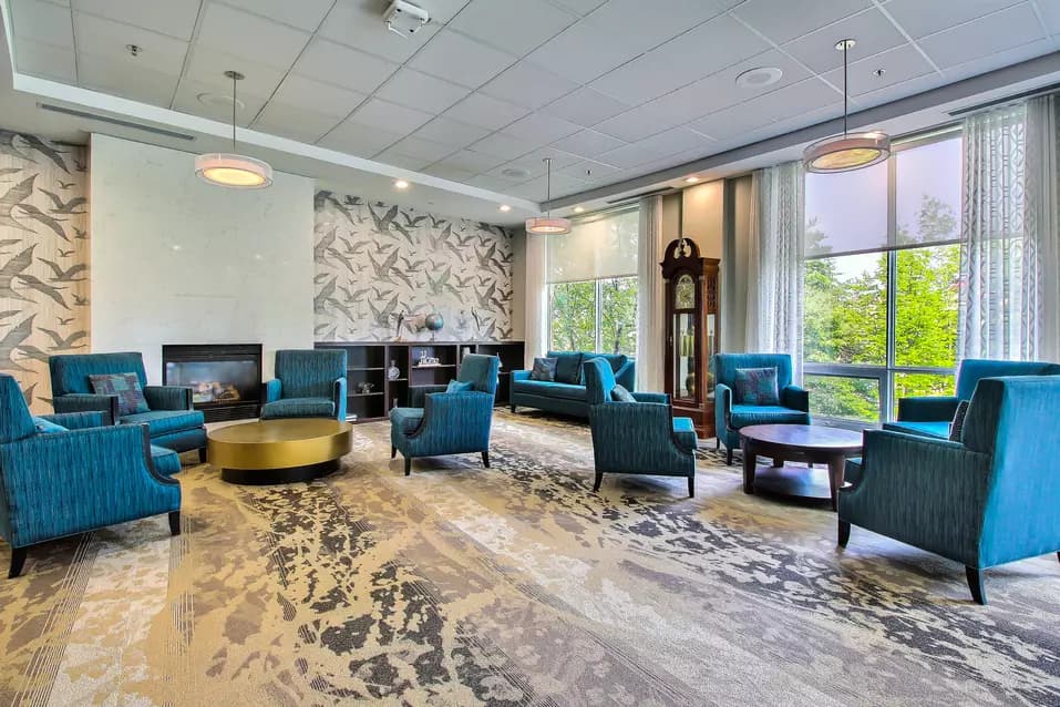 modern lounge at chartwell stillwater creek retirement residence